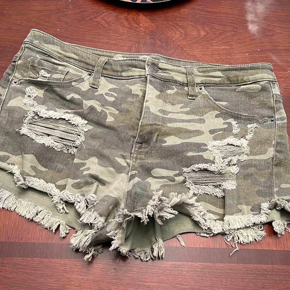 Ripped camo shorts